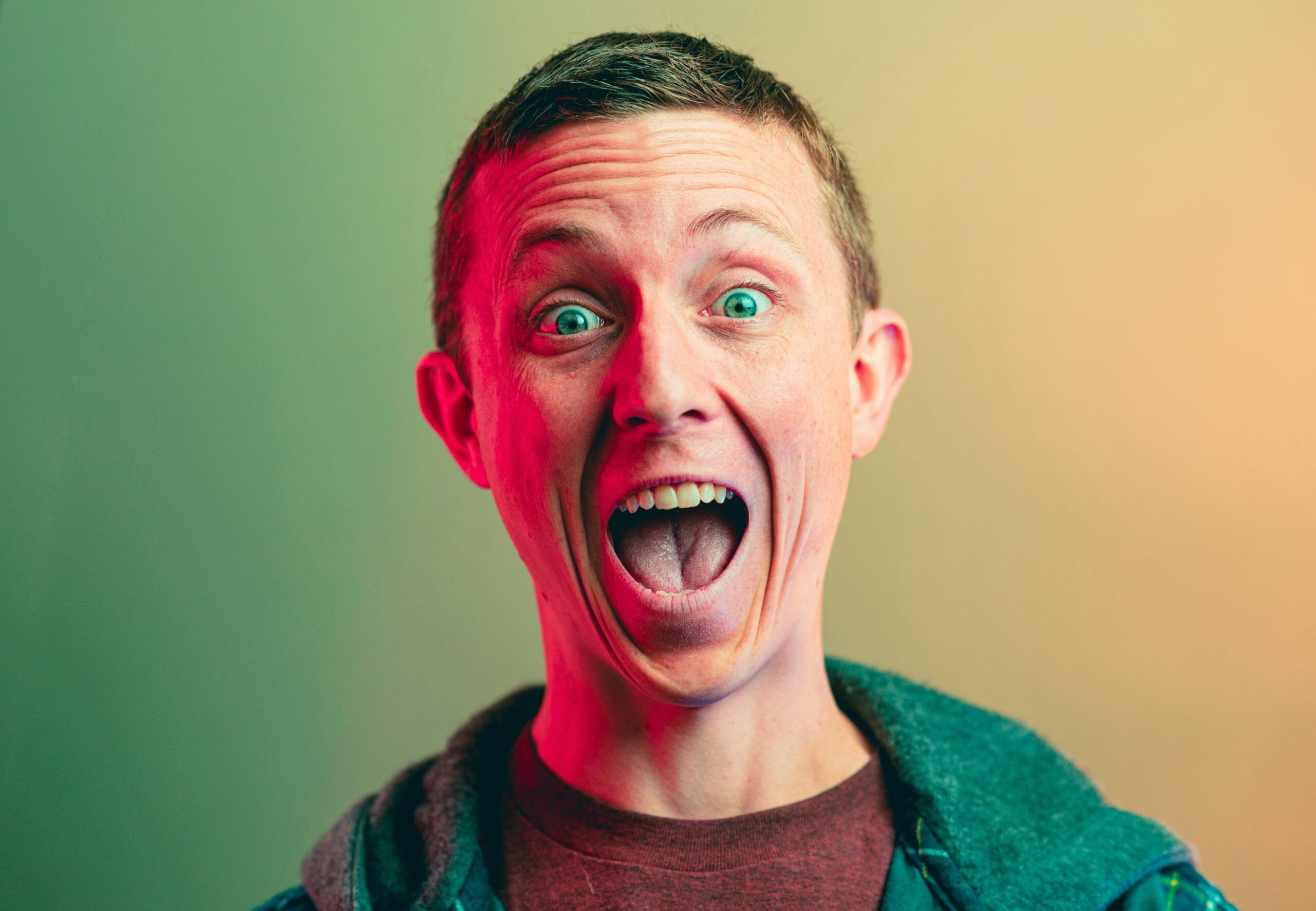 man in green crew | Eddy Andrews Marketing man in green crew neck shirt smiling